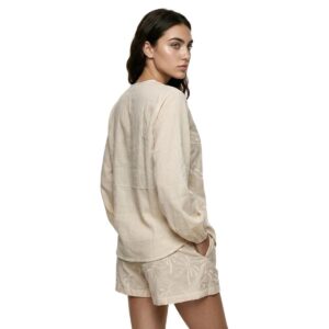 Short Garotas beige con palmera bordada